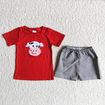 Red shirt with embroidery cow black grid shorts