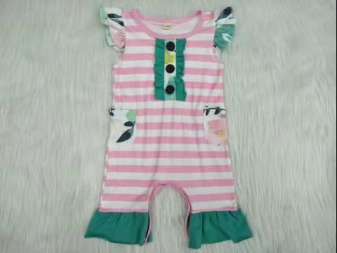 White romper with pink stripe pocket and three black buttons
