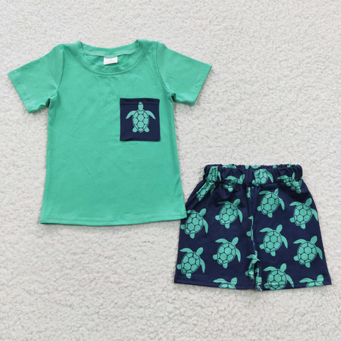 Green shirt  with a pocket turtle shorts with tortoises